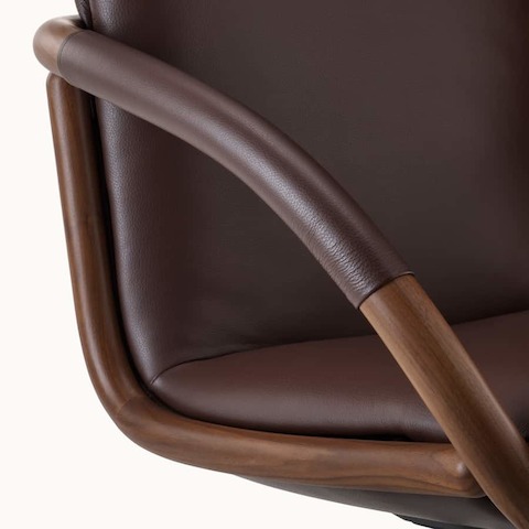 Full Loop chair leather-wrapped arm detail shot.