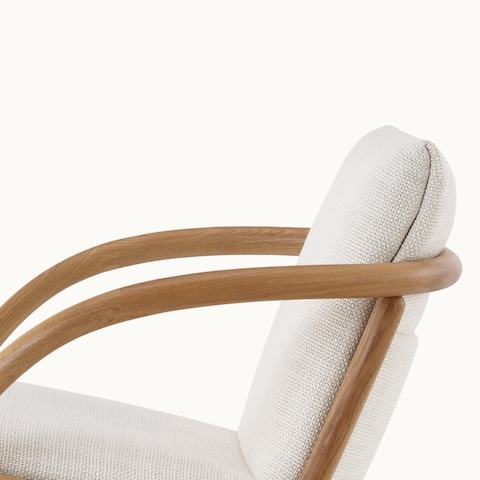 Side view of Full Loop Lounge Chair in Oak and Capri.