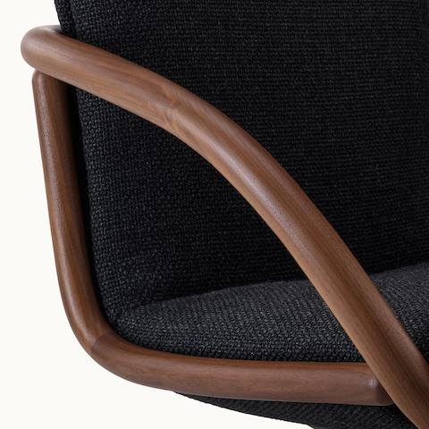 Full Loop Lounge Chair wood arm detail shot.