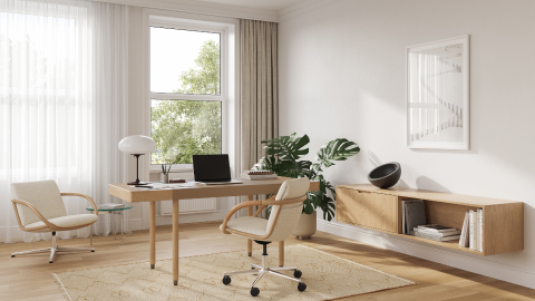 Full Loop office chair at a Leatherwrap Sit-to-Stand Desk home office setting, with the Full Loop Lounge Chair and Geiger One floating credenza.