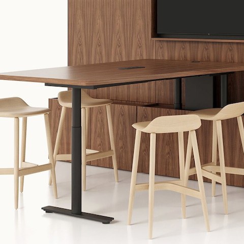 Geiger One Meeting and Huddle Room in Natural Walnut with Crosshatch Stools.