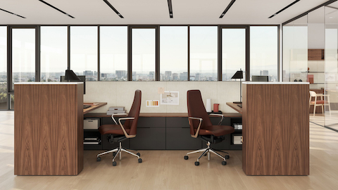 Geiger One Open Plan workstations in Natural Walnut with Taper Chairs.