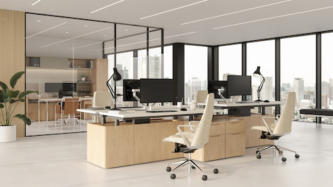 Geiger One Open Plan workstations in Natural Oak with Taper Chairs.
