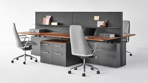 A four-pack bench system featuring Geiger One Casegoods, Taper Chairs, and accessories.