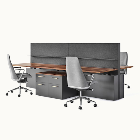 A four-pack bench system featuring Geiger One Casegoods and Taper Chairs.