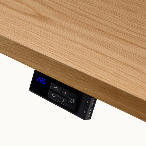 Detail view of Geiger One Casegoods height-adjustable desk control panel.