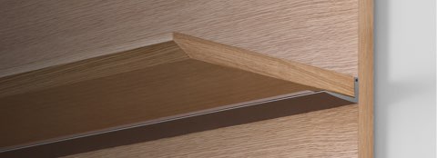 Close-up of the underside of a Geiger Shelf System shelf, showing the hidden fasteners.