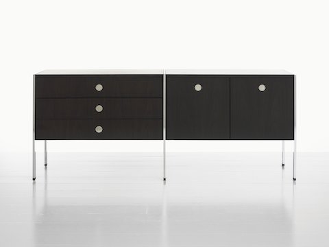 A two-unit H Frame Storage credenza with a dark wood finish and modules for box drawers and enclosed cabinets.