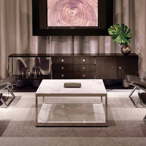 An interaction space featuring a three-unit H Frame Storage credenza and a square H Frame Table.