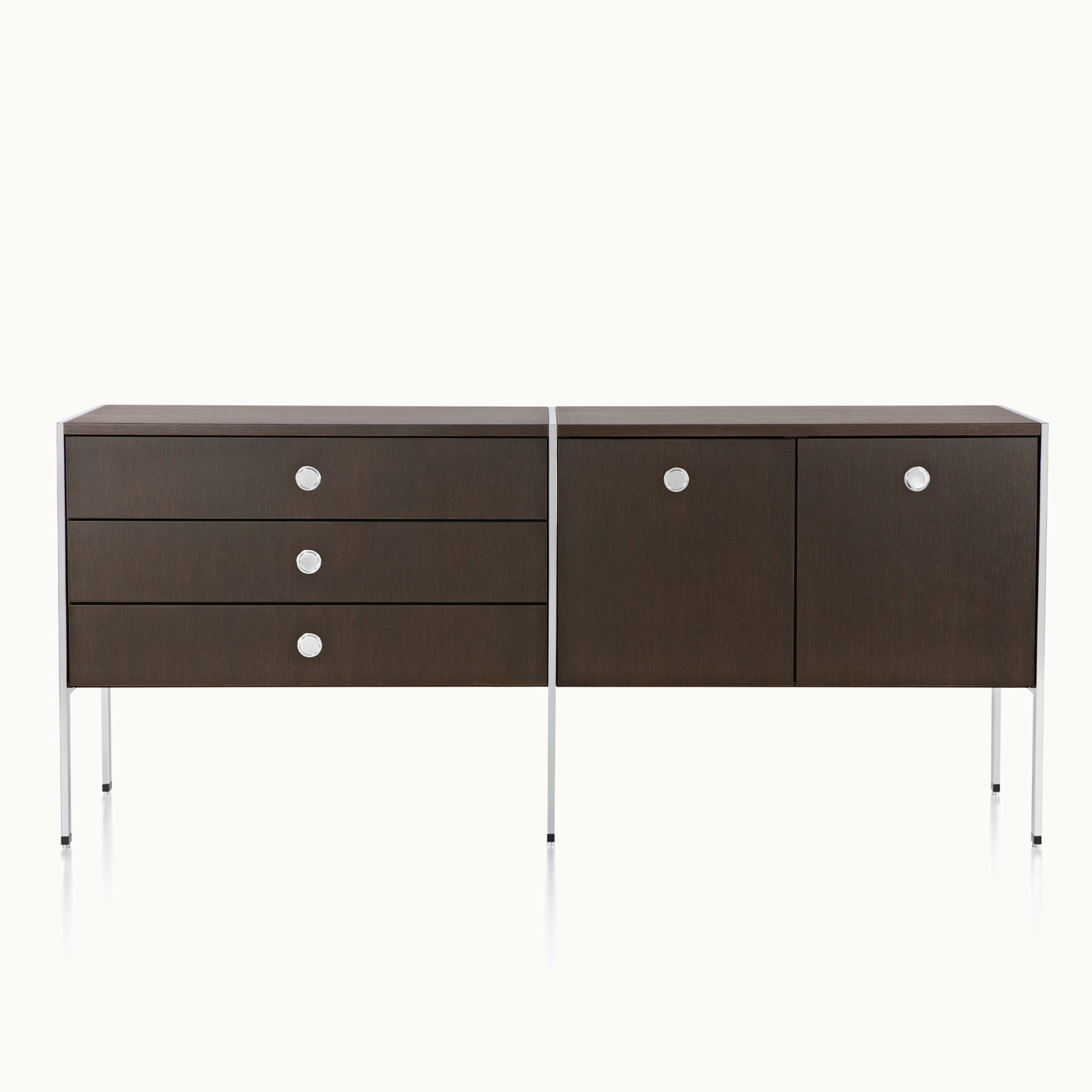 A two-unit H Frame Storage credenza with a dark wood finish and modules for box drawers and enclosed cabinets.