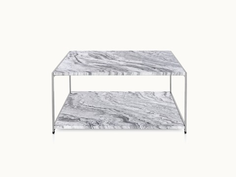 An H Frame coffee table with a metal frame and stone upper and lower surfaces.