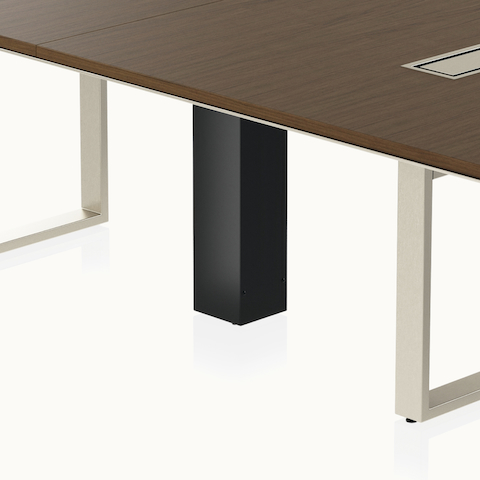 Highline Conference Table by DatesWeiser in Cashmere Flat Cut Walnut with Satin Nickel edge and base viewed from a 45 degree angle.