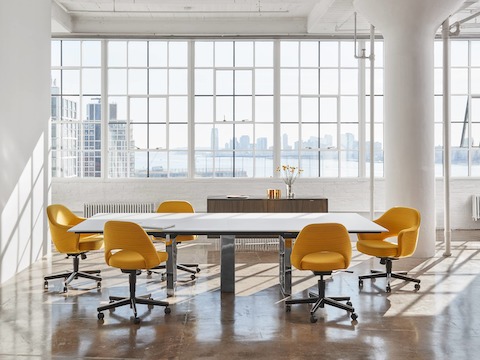 Highline Conference Table by DatesWeiser in a Conference Room setting, front view with credenza in background.