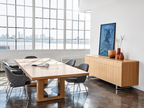 Highline 50 Conference Table by DatesWeiser in a Conference Room setting with Highline 25 Credenza, angled view.