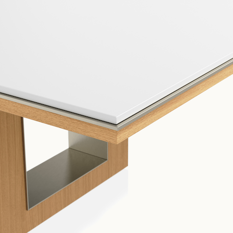 Edge detail shot of Rectangular Highline Fifty Conference Table by DatesWeiser in Glacier White Corian and Natural Rift Cut Oak with a Satin Nickel edge.