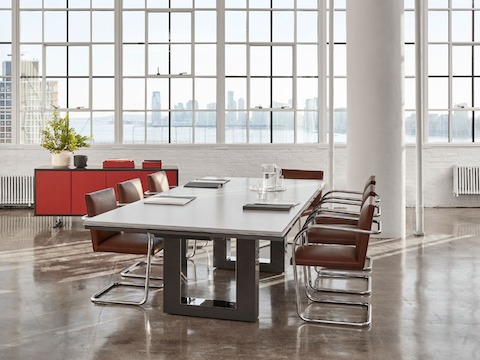 Highline 50 Conference Table by DatesWeiser in a Conference Room setting with Highline 25 Credenza.