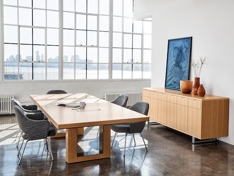 Highline 50 Conference Table by DatesWeiser in a Conference Room setting with Highline 25 Credenza, angled view.