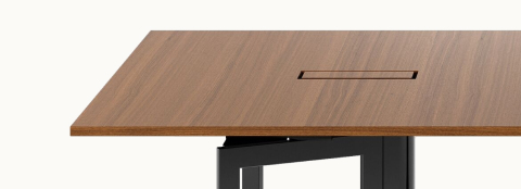 Highline Vector Conference Table by DatesWeiser in Natural Quarter Cut Walnut with a Jet Black base viewed from the front.