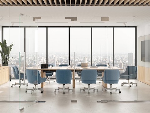 Bumper Chairs in a low arm version in a Conference Room setting with JD Conference Table and Credenza.