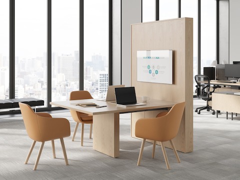 JD Media Table by DatesWeiser in Natural Oak with Saiba Side Chairs and Geiger One Open Plan Workstation in Background.