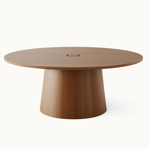 JD Meeting Table by DatesWeiser with round top and round tapered base in natural quarter cut walnut shown front-facing on a white sweep.