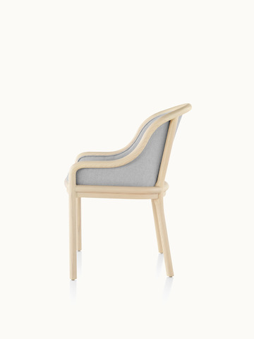 Side view of a Landmark side chair with light gray French upholstery, a light wood frame, and low arms.