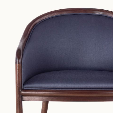 Partial front view of the dark blue seat and back of a Landmark side chair, showing the detailed French upholstery.