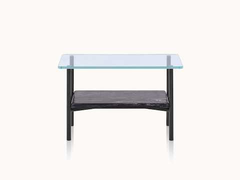 A Layer side table with a glass top and black marble lower shelf, viewed from the front.