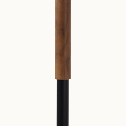 Detail of a raised Leatherwrap Sit-to-Stand Desk leg.