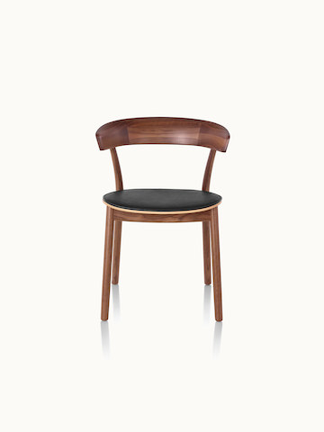 A Leeway side chair with a wood frame and backrest in a medium finish and a seat upholstered in black leather, viewed from the front.