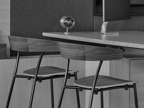 Black-and-white image of two Leeway side chairs used as guest seating in an executive office. Black-and-white image of two Leeway side chairs used as guest seating in an executive office.