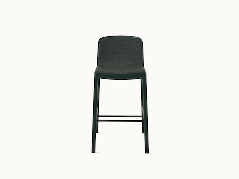 Lijn Stool by Carole Baijings for Geiger in Ivy frame upholstered with Bellano in Black Green, front view on a white sweep. Lijn Stool by Carole Baijings for Geiger in Ivy frame upholstered with Bellano in Black Green, front view on a white sweep.