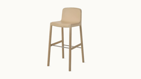 Lijn Stool by Carole Baijings for Geiger in Light Beech frame upholstered with Maharam Prone Leather in Balsa, angled front view on a white sweep. Lijn Stool by Carole Baijings for Geiger in Light Beech frame upholstered with Maharam Prone Leather in Balsa, angled front view on a white sweep.