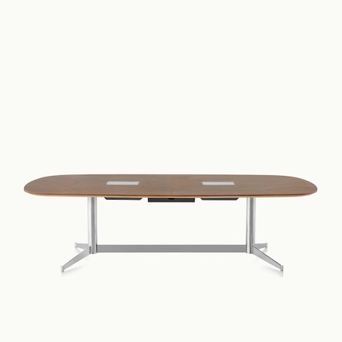 An oblong MP Conference Table with a medium-tone recograin rosewood finish, viewed from the front.