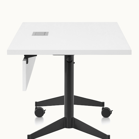 A rectangular MP Flex Table with a white laminate top and black base, viewed from the side.