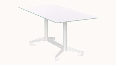 Angled view of a rectangular MP Table with a white back-painted glass top and white base.