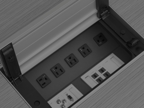 Black-and-white image of an MP Tables power center, showing the flip lid in the open position to reveal technology connections.