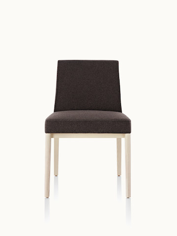 An armless Nessel side chair with black fabric upholstery and a wood frame with a light finish, viewed from the front.