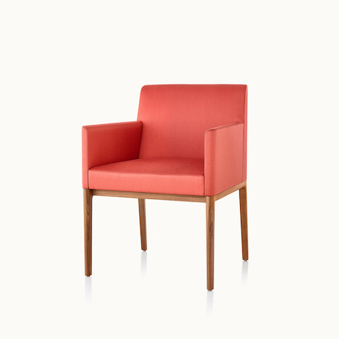 Angled view of a Nessel side chair with wraparound arms and red upholstery. Select to go to the Nessel Chair product page.