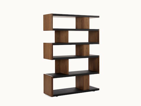 New Canaan High Bookshelf designed by BassamFellows for Geiger in Walnut with Black Leather shown angled on a white sweep.