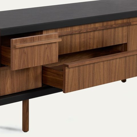 New Canaan Media Unit designed by BassamFellows for Geiger in Walnut with Black Leather with open drawer and cabinet door in front view on a white sweep.