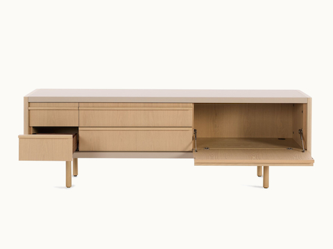 New Canaan Media Unit designed by BassamFellows for Geiger in Oak with Champagne Leather with open drawer and cabinet door in front view on a white sweep.