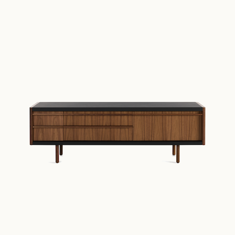 New Canaan Media Unit designed by BassamFellows for Geiger in Walnut with Black Leather shown in front view on a white sweep.