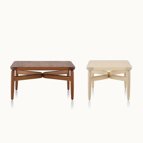 A rectangular Reframe occasional table with a medium finish next to a square Reframe occasional table with a light finish.