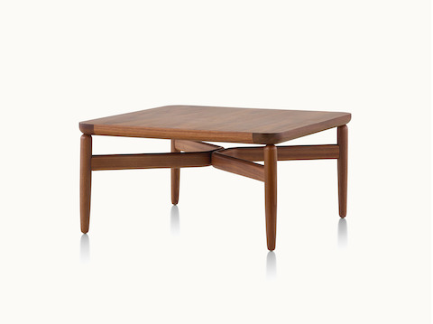 A Reframe occasional table with a medium wood finish, viewed at an angle.