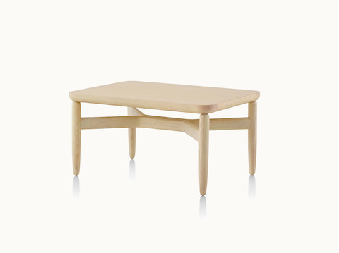 A Reframe occasional table with a light wood finish, viewed at an angle.
