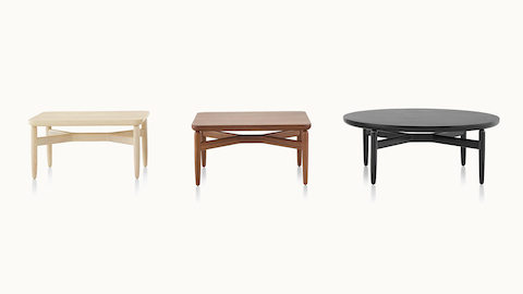 Three Reframe occasional tables with light, medium, and black finishes.