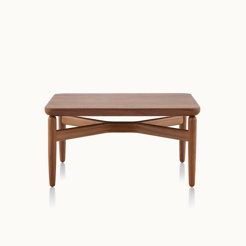 A rectangular Reframe occasional table with a medium wood finish, viewed from the front.