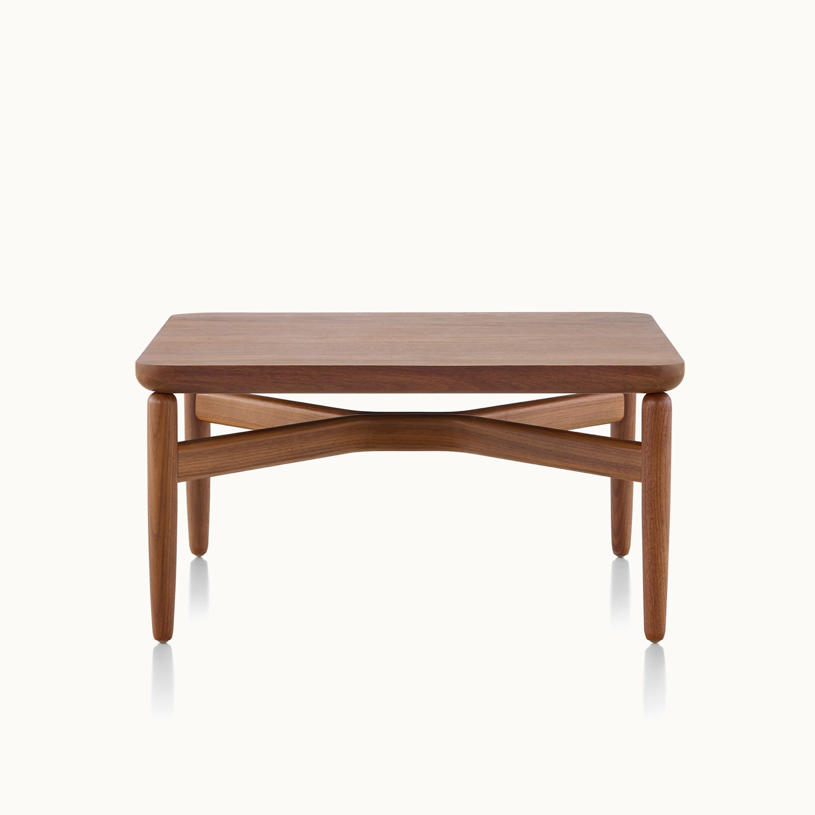 A rectangular Reframe occasional table with a medium wood finish, viewed from the front.