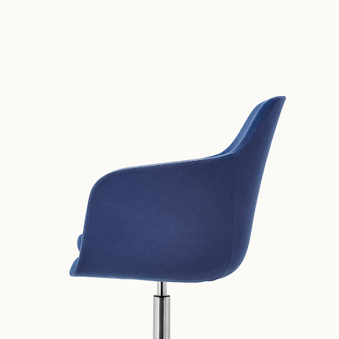 Side view of a mid-back Saiba Chair with dark blue upholstery.